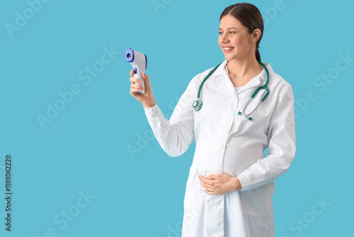 Young pregnant doctor with ...