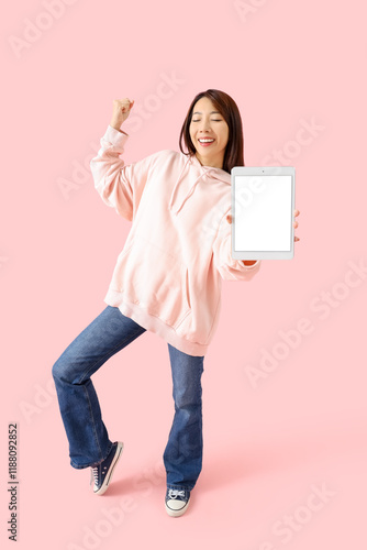 Happy young Asian woman wit...