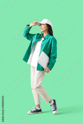 Young Asian woman with lapt...