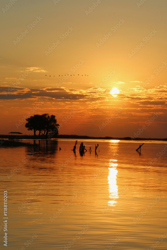 Fototapeta premium African Sunset Over Water