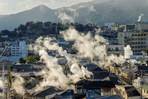 Obraz na płótnie Beppu cityscape with Steam drifted from public hot spring baths and ryokan onsen background, Beppu, Oita, Kyushu, Japan. w salonie