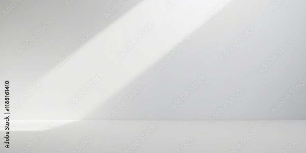 A Clean White Room With a Diagonal Beam of Light Creating a Simple, Minimalist Aesthetic A Clean White Room With a Diagonal Beam of Light Creating a Simple, Minimalist Aesthetic