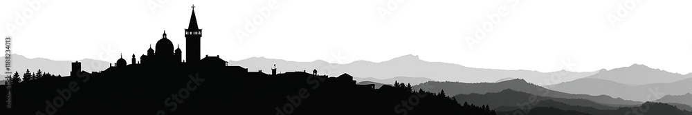 Silhouette of a historic building against a mountainous landscape at dusk. Silhouette of a historic building against a mountainous landscape at dusk.