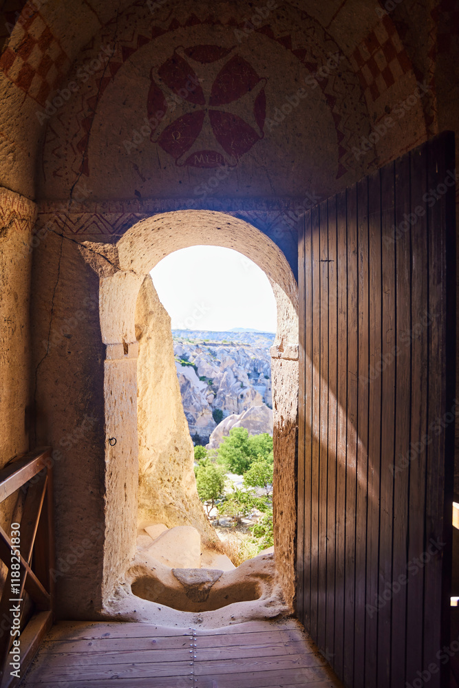 Fototapeta premium An ancient Byzantine cave city in Cappadocia. Murals in a cave Christian church. Goreme, Turkey
