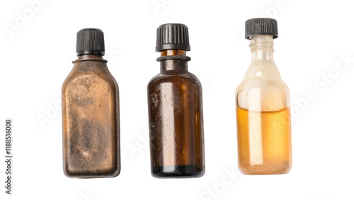 Three vintage glass bottles filled with various liquids on a transparent background photo