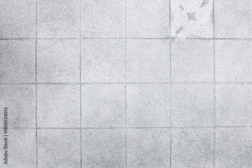 Gray stone background with imitation tiles. Top view. Free space for text or design. Gray stone background with imitation tiles. Top view. Free space for text or design.