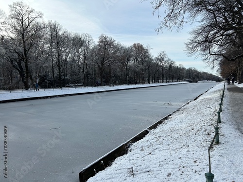 Frozen Nymphenburg Canal in Munich Near Nymphenburg Palace on a Clear Winter Day photo