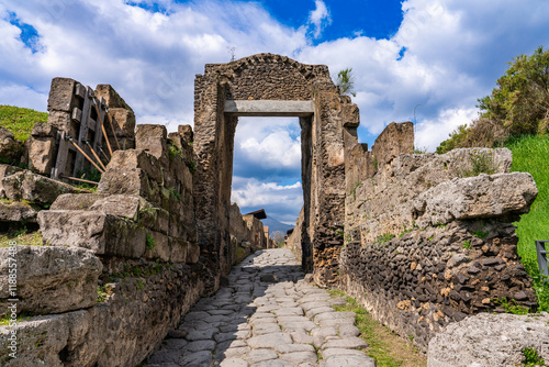 Pompei, Italy - 22 march 2024 - Tourist wandering at the Pompei ground visiting the ancient Roman city at the Nuceria Gate