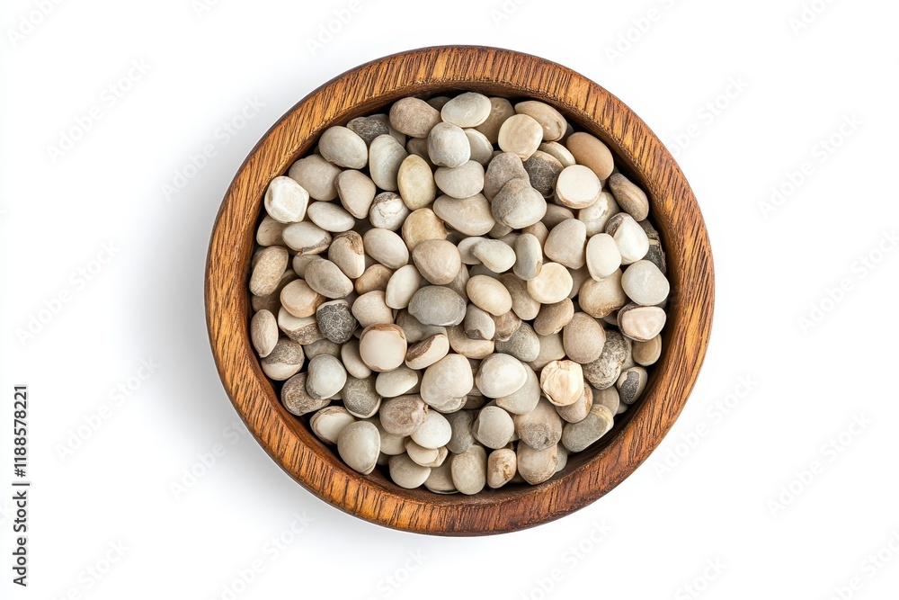 Wooden bowl with job s tears on a white background viewed from above Wooden bowl with job s tears on a white background viewed from above