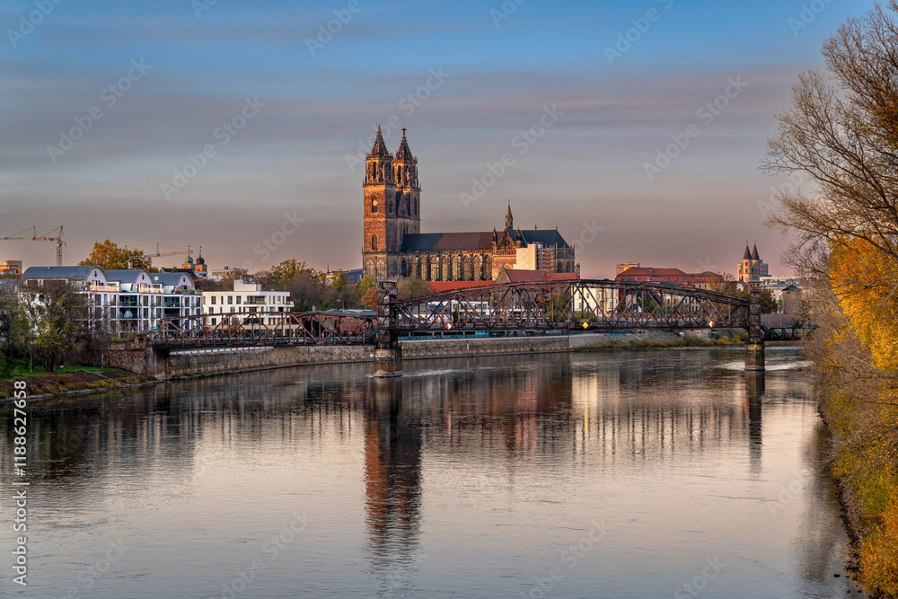 beautiful Magdeburg city panorama, November 22, 2022, Germany, Saxony-Anhalt in winter evening light with the famous Magdeburg Cathedral, Elbe river and the old lift bridge, blue hour cityscape beautiful Magdeburg city panorama, November 22, 2022, Germany, Saxony-Anhalt in winter evening light with the famous Magdeburg Cathedral, Elbe river and the old lift bridge, blue hour cityscape