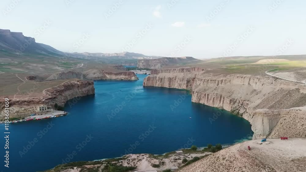 Aerial View of a Beautiful Lake Nestled Between Majestic Mountains Aerial View of a Beautiful Lake Nestled Between Majestic Mountains
