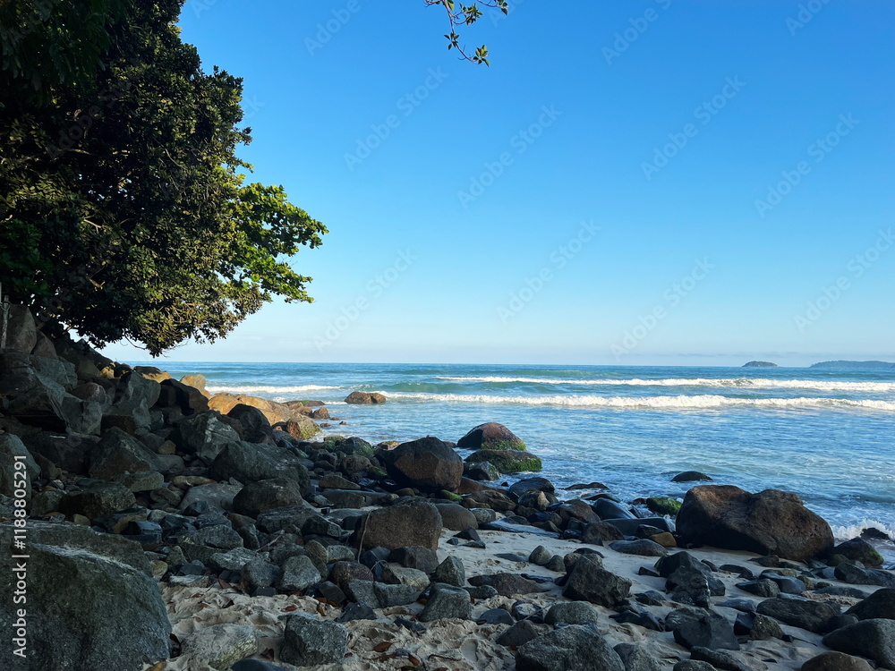 Toninhas Beach in Ubatuba, rocks, sand, sea Toninhas Beach in Ubatuba, rocks, sand, sea