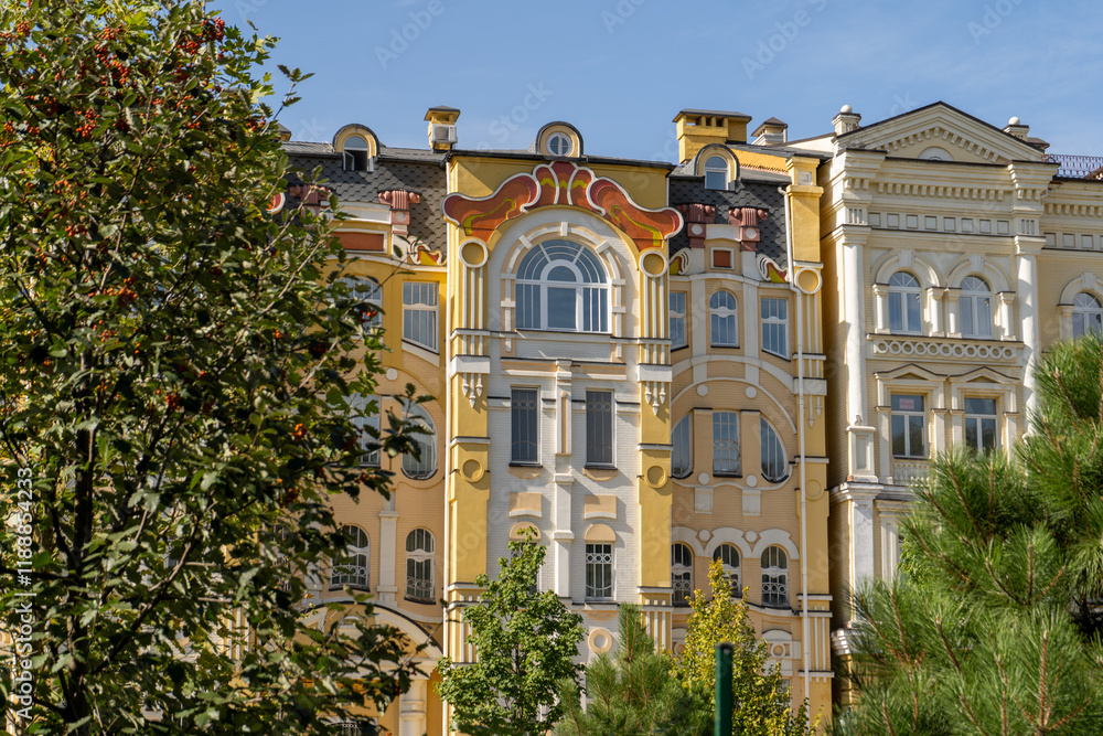 Fototapeta premium Orange yellow color modern exterior of Houses Buildings. Bright architecture street