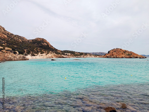 Clear waters and wind-blown granite make Cala dell’Amore (cove Conneri) a haven for wildlife and a pristine paradise for tourists. Spargi Island, Archipelago La Maddalena, Sardinia Island, Italy. photo