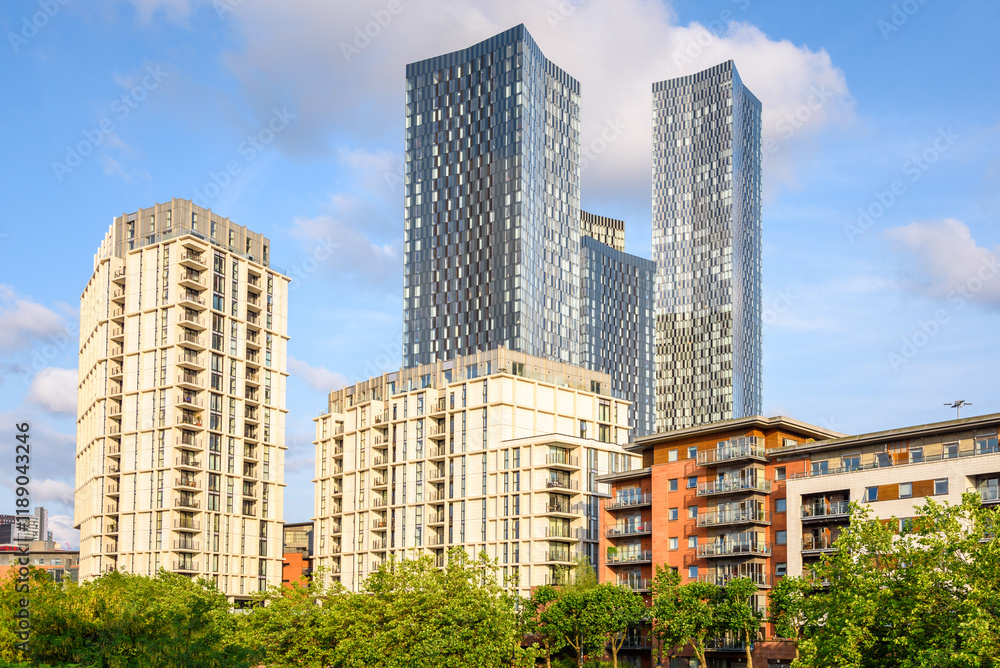 Fototapeta premium Modern apartment blocks and towers in Manchester on a sunny summer day