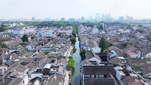 Explore Pingjiang Road historical district in Suzhou through stunning aerial views showcasing its unique architecture and waterways photo