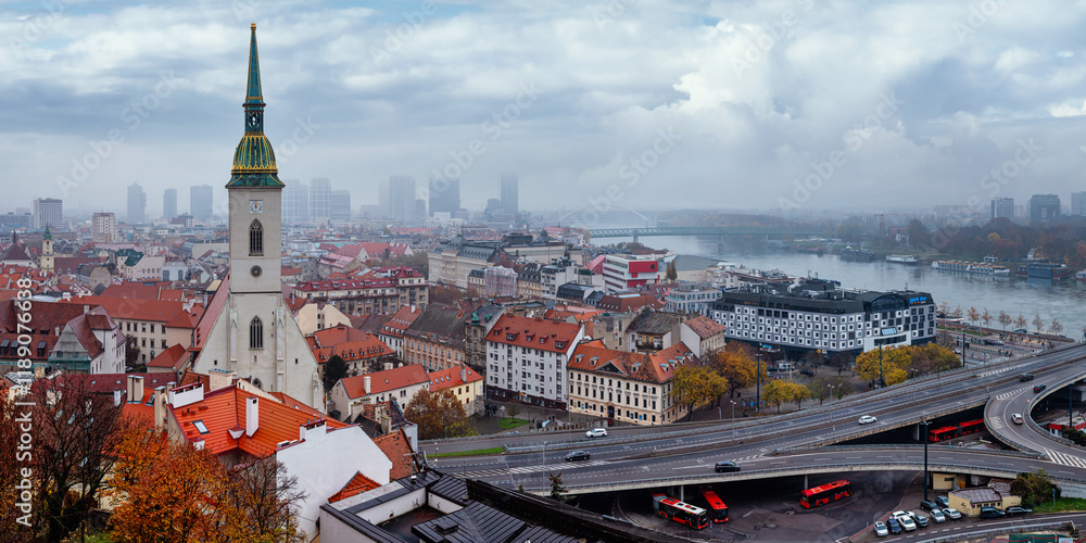Autumn cityscape - view of Bratislava with St. Martin's Cathedral and Danube River, Slovakia