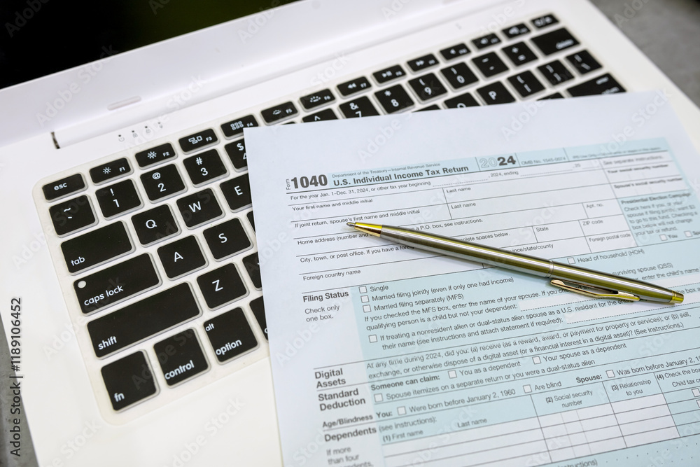 Tax form 1040 with pen and filing concept. Individual Income Tax Return.