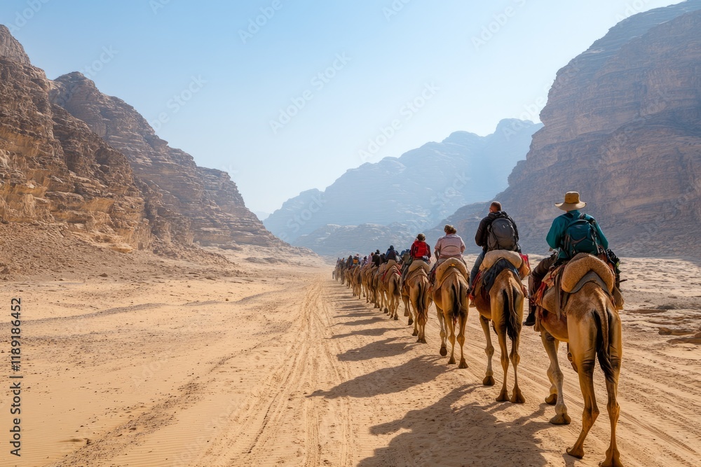 Fototapeta premium Tourists enjoying a camel ride through the stunning rock formations
