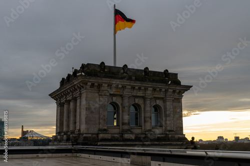Flag of Germany flying on top of the Reichstag Building in Berlin