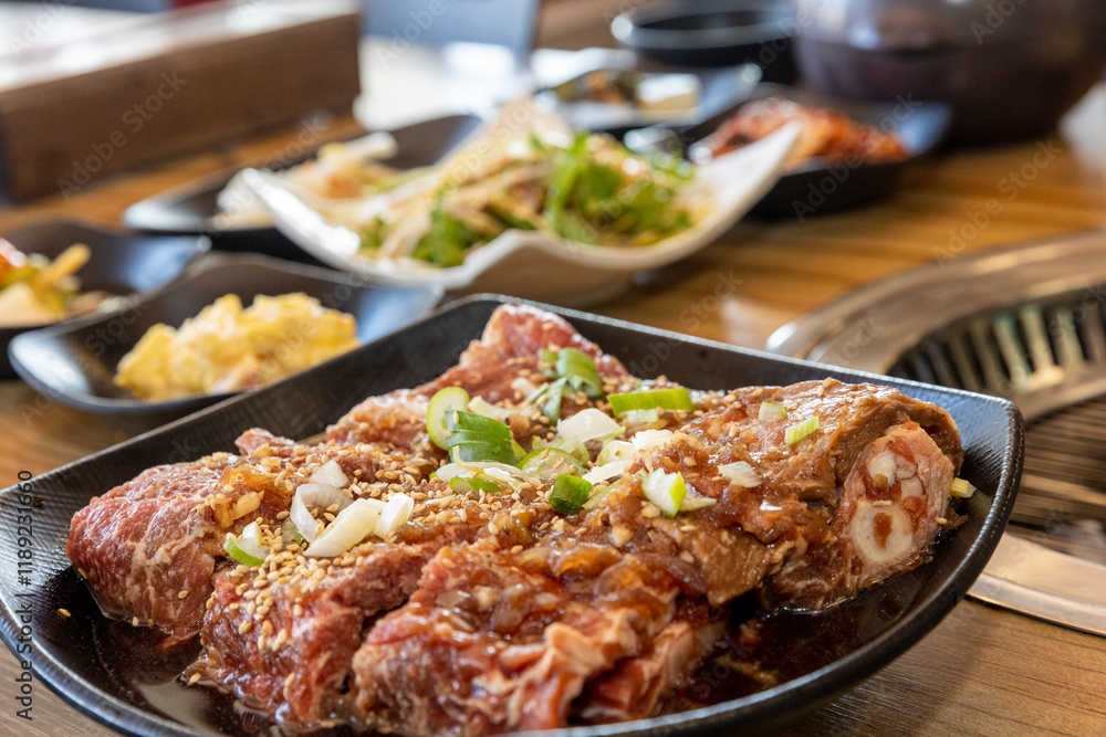 Fototapeta premium Korean BBQ. Seasoned beef ribs