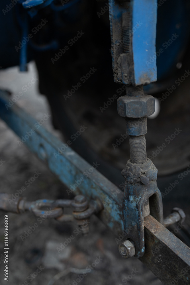 metal part from a metal part from a tractor. High quality photo metal part from a metal part from a tractor. High quality photo