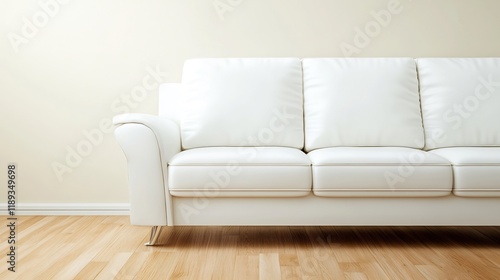 Elegant white leather sofa sits serenely against a warm light wall. AI Generated