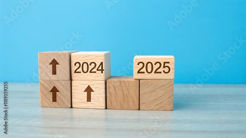 Wallpaper Mural 2025 Happy New Year. Wooden cube block change from 2024 to 2025 on blue. Concept 2025 New Year background. Business, resolutions, goals, inspiration, success, ideas Torontodigital.ca