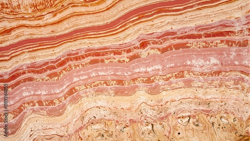 Vibrant multicolored sandstone layers with intricate erosion patterns resembling a desert canyon wall photo