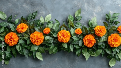 Bright orange flowers arranged in a beautiful display on a neutral background
