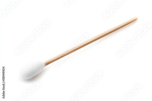 close-up of a single cotton swab on a white background