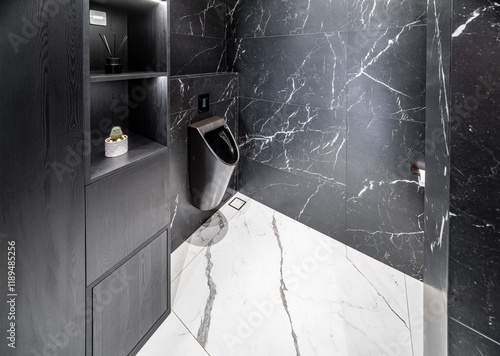 Black marble toilet. Private house.