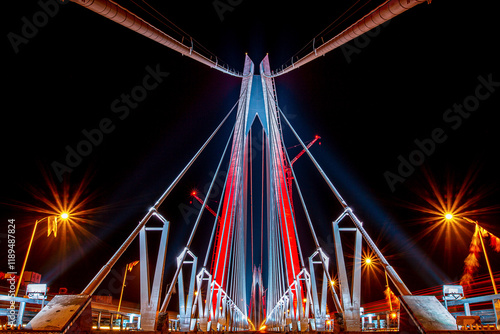 Yavuz Sultan Selim Bridge Istanbul, Turkiye. Stunning Night View of a Modern Cable-Stayed Bridge Under Construction.A captivating low-angle shot of a modern cable-stayed bridge at night. photo