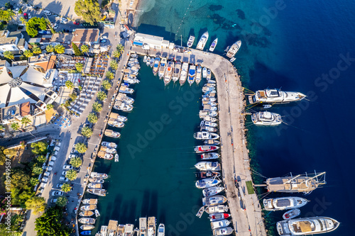 Fototapeta Naklejka Na Ścianę i Meble -  Gundogan Bay of Bodrum. Mugla, Turkey. Aerial panoramic view of Gundogan Bay. Drone shot.