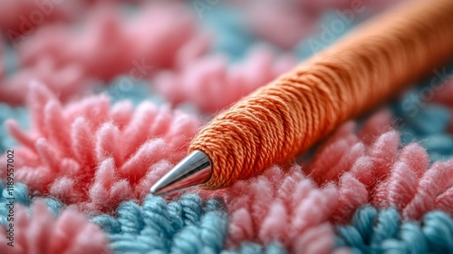 Vibrant yarn and crochet hook on a colorful handmade blanket in a cozy crafti...