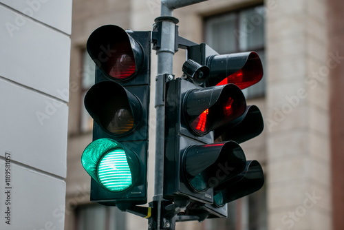 Fotografie Green traffic light and red pedestrian light for traffic control signaling