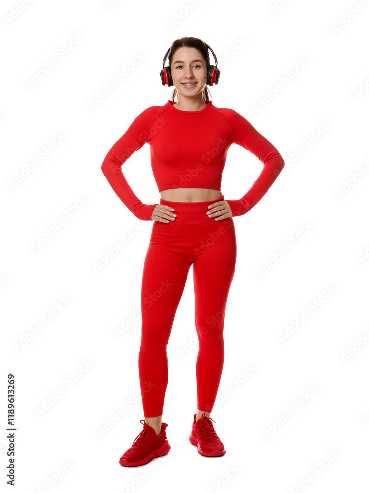 Woman in sportswear and headphones on white background Woman in sportswear and headphones on white background