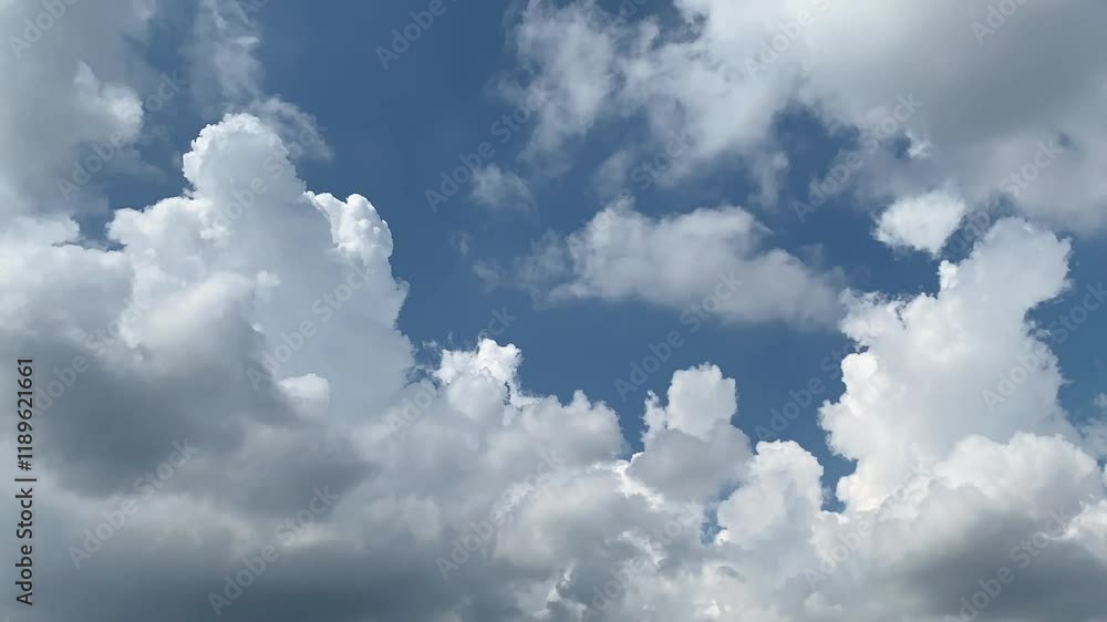 motions clouds. timelapse on blue sky with moving fluffy clouds motions clouds. timelapse on blue sky with moving fluffy clouds
