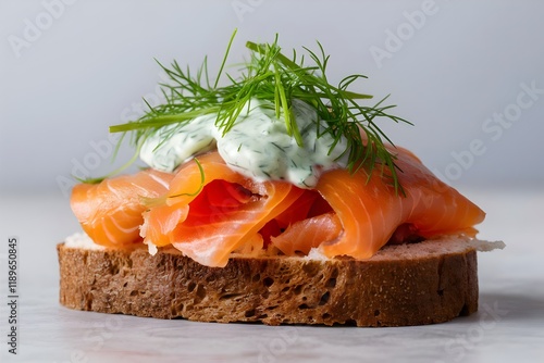 Open-Faced Rye Bread Sandwich with Smoked Salmon and Dill Sauce photo