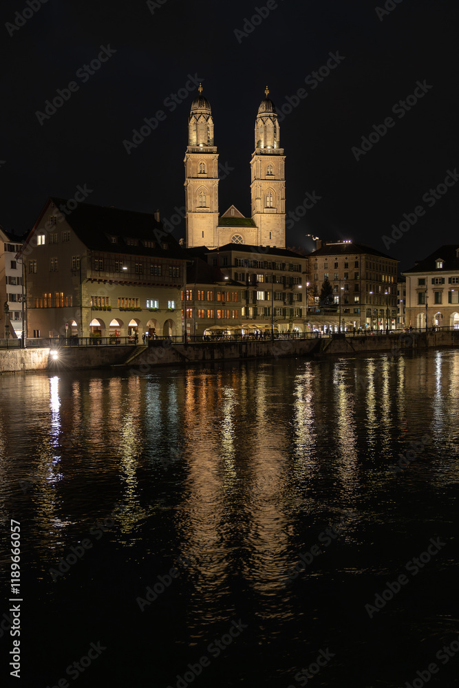 Nighttime View of Historic City Center with Illuminated Cathedral and Buildings in Zurich Nighttime View of Historic City Center with Illuminated Cathedral and Buildings in Zurich