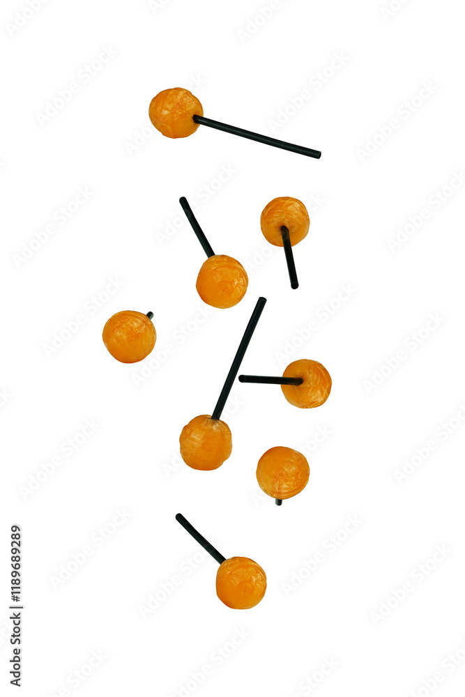 Falling orange lollipops isolated on transparent background, full depth of field. Png and Jpg image. Falling orange lollipops isolated on transparent background, full depth of field. Png and Jpg image.