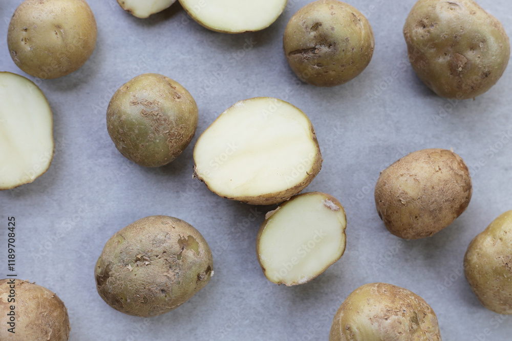 Fototapeta premium Raw fresh organic potatoes, Tiny potatoes
