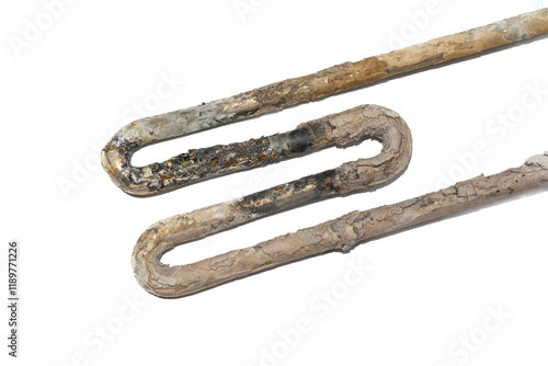 Obraz na płótnie Corroded Water Heater Element with Lime Scale Deposits isolated on white w salonie