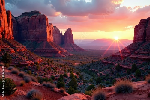 Majestic red rock formations tower above a serene canyon landscape at dawn, red rock, arizona, rocky terrain photo