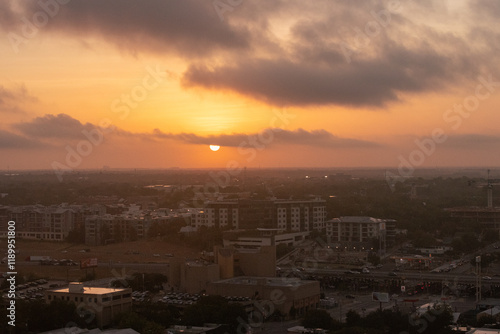 The Sun rises over Austin, Texas, USA during a dangerous Summer heat wave that has been straining the power grid and causing brownouts and electrical shortages on the ERCOT power grid 
