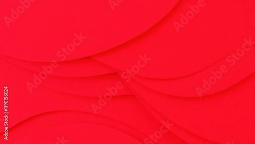 A flowing red satin fabric with a soft, wave-like texture
