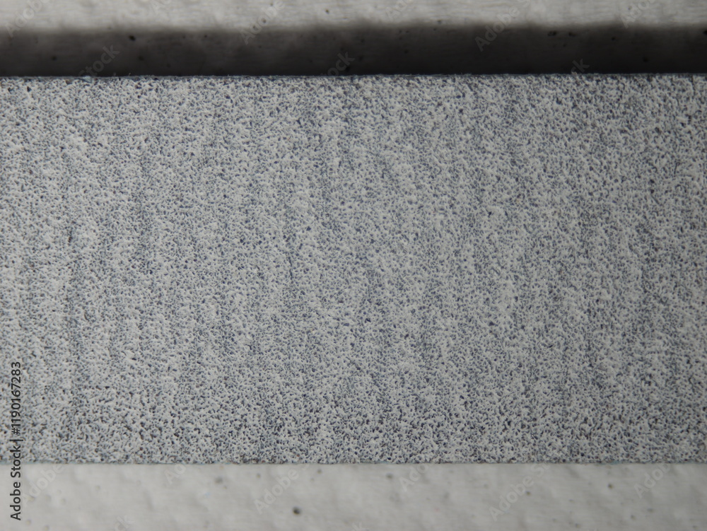 Fototapeta premium A grey and white striped surface with a lot of texture