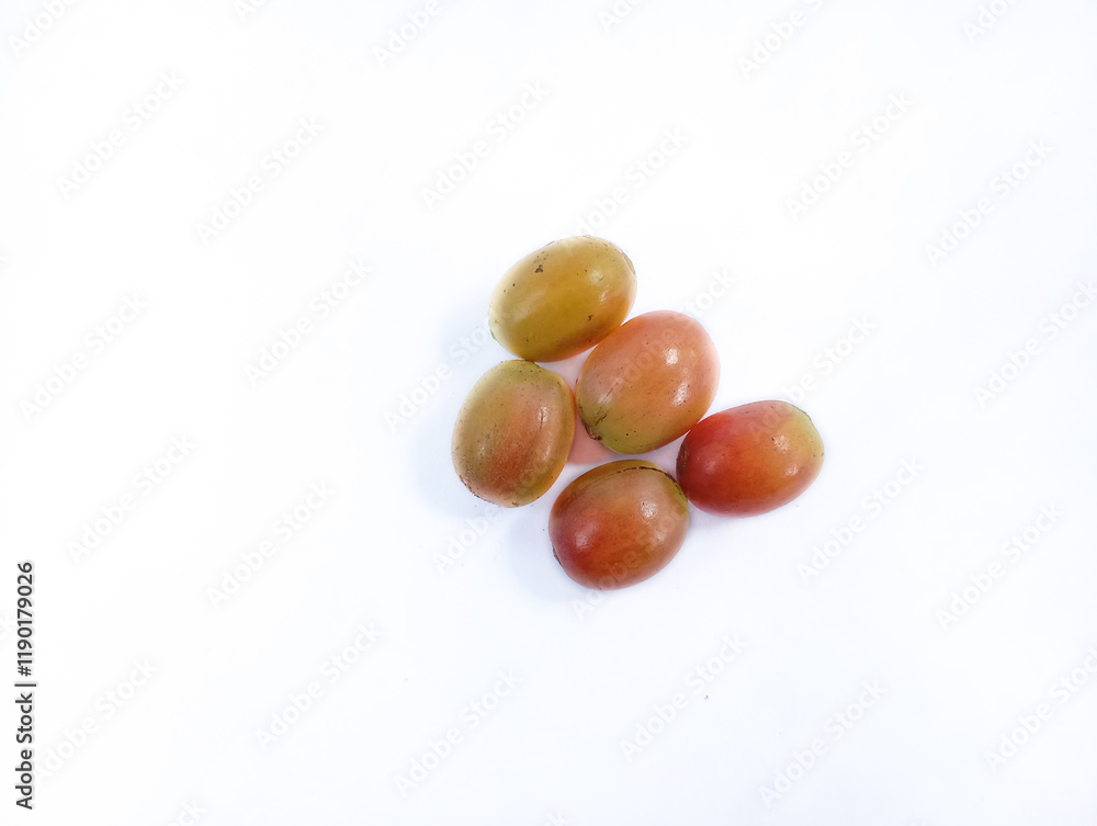 bunch of ripe coffee berries on a tree isolated on white background bunch of ripe coffee berries on a tree isolated on white background
