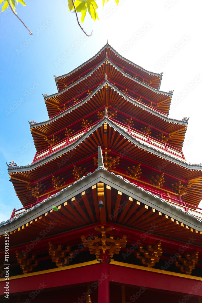 Close-up view of a meticulously crafted roof structure, likely part of an Asian pagoda or temple. Close-up view of a meticulously crafted roof structure, likely part of an Asian pagoda or temple.