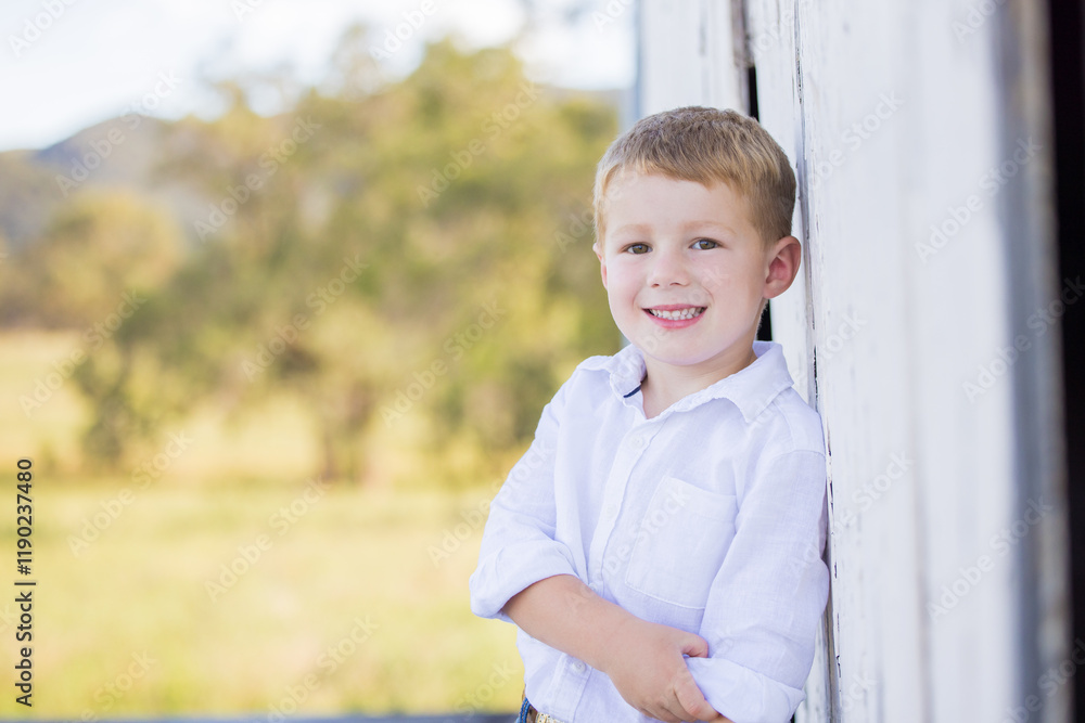 Portrait of happy little boy smiling on farm Portrait of happy little boy smiling on farm